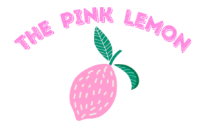 An illustrated pink lemon with green leaves, and the words 'The Pink Lemon' in an arc above it. This is the logo for the website.